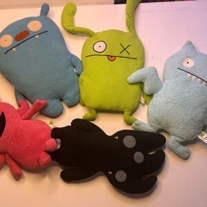 Pink and Green and Black Plush Toys